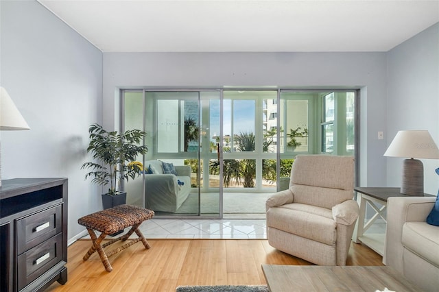 2110 Benjamin Franklin Dr Unit 301, Sarasota, FL 34236 - living area with healthy amount of natural light and light wood-type flooring