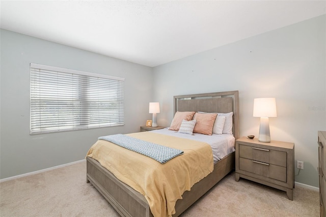 2110 Benjamin Franklin Dr Unit 301, Sarasota, FL 34236 - bedroom with light carpet and baseboards