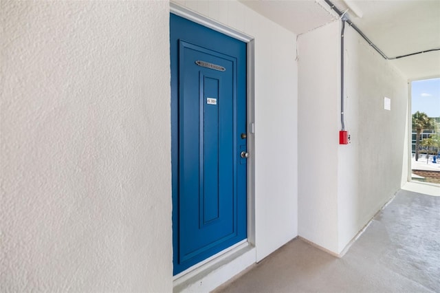 2110 Benjamin Franklin Dr Unit 301, Sarasota, FL 34236 - property entrance with stucco siding
