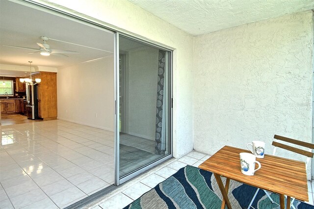 3985 Maceachen Blvd Unit 224, Sarasota, FL 34233 - balcony with a ceiling fan and a sink