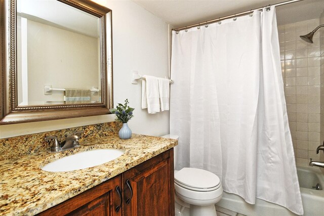 3985 Maceachen Blvd Unit 224, Sarasota, FL 34233 - full bath featuring vanity and shower / tub combo with curtain