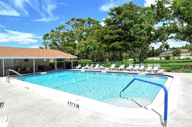 3985 Maceachen Blvd Unit 224, Sarasota, FL 34233 - community pool featuring a patio