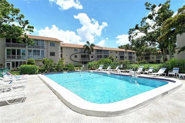 3985 Maceachen Blvd Unit 224, Sarasota, FL 34233 - community pool with a patio
