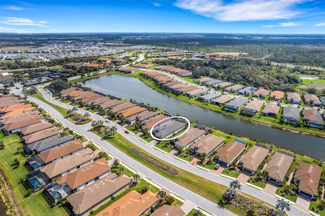 5469 Lampiasi St, Sarasota, FL 34238 - aerial overview of property's location with nearby suburban area and a large body of water