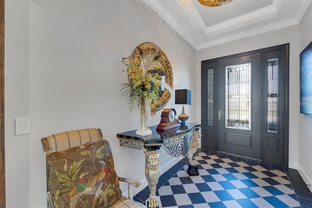 5469 Lampiasi St, Sarasota, FL 34238 - foyer with tile patterned floors, ornamental molding, and a raised ceiling