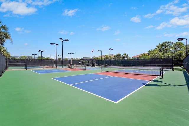5469 Lampiasi St, Sarasota, FL 34238 - view of tennis court with community basketball court