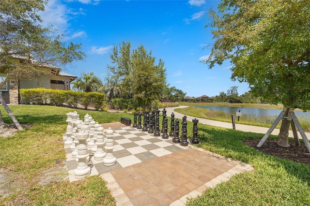 5469 Lampiasi St, Sarasota, FL 34238 - view of green lawn featuring a water view