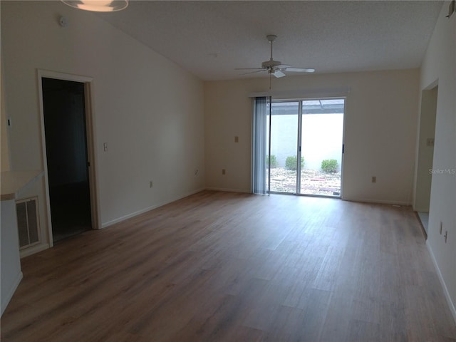 4154 Center Pointe Cir Unit 57A, Sarasota, FL 34233 - empty room with ceiling fan and light wood-style floors