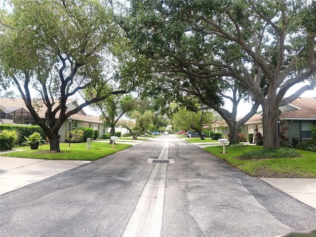 4154 Center Pointe Cir Unit 57A, Sarasota, FL 34233 - view of asphalt street with a residential view
