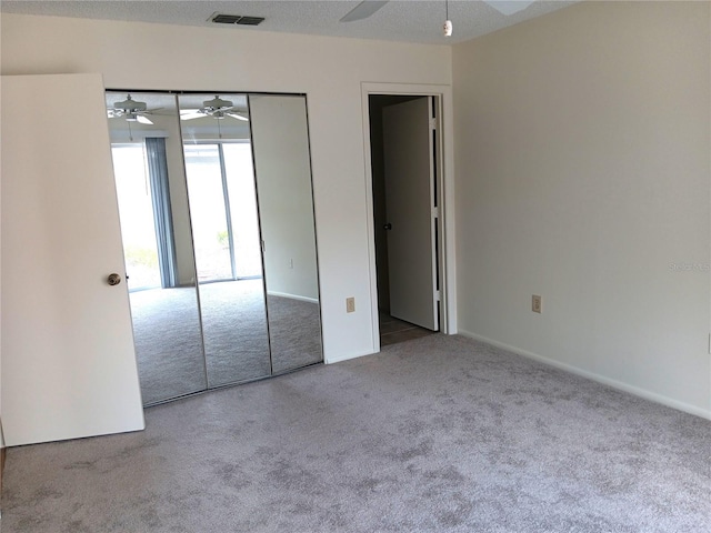 4154 Center Pointe Cir Unit 57A, Sarasota, FL 34233 - unfurnished bedroom with carpet flooring and ceiling fan