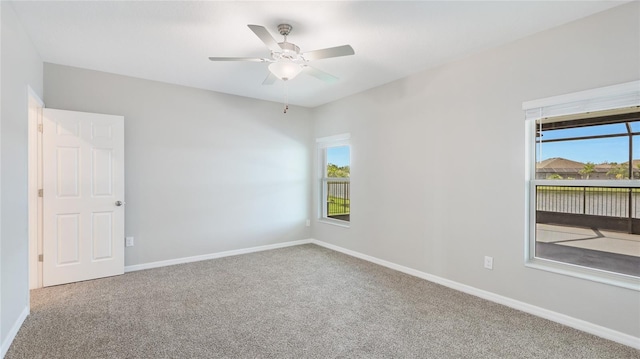 5327 Olano St, Palmetto, FL 34221 - carpeted empty room with plenty of natural light and a ceiling fan