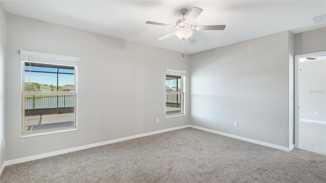 5327 Olano St, Palmetto, FL 34221 - carpeted empty room with plenty of natural light and ceiling fan