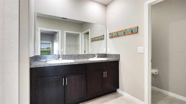 5327 Olano St, Palmetto, FL 34221 - bathroom featuring double vanity and tile patterned floors