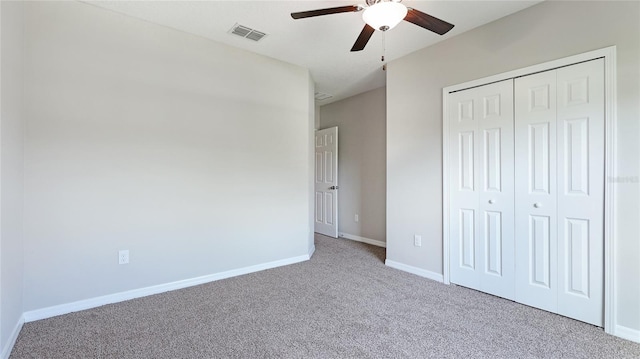 5327 Olano St, Palmetto, FL 34221 - unfurnished bedroom with carpet flooring, a closet, and ceiling fan
