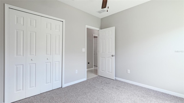 5327 Olano St, Palmetto, FL 34221 - unfurnished bedroom with carpet, a closet, and ceiling fan