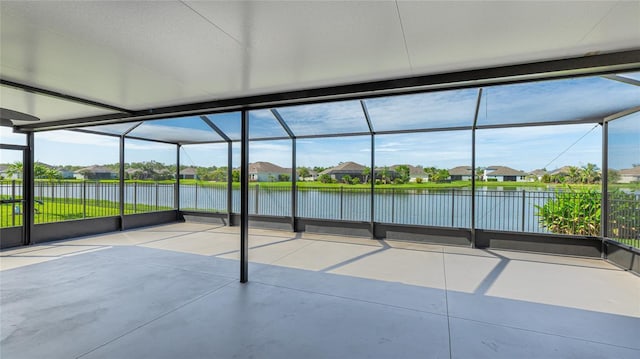 5327 Olano St, Palmetto, FL 34221 - unfurnished sunroom featuring a water view, a residential view, and plenty of natural light