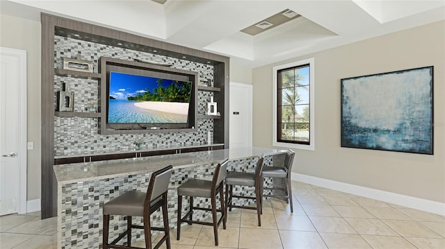 5327 Olano St, Palmetto, FL 34221 - dining room featuring light tile patterned floors, a tray ceiling, and crown molding