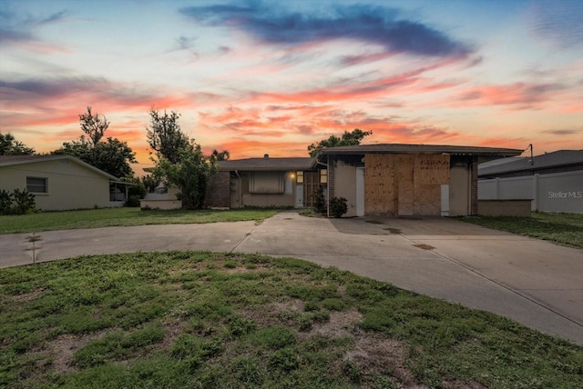 268 Alsace Ave, Venice, FL 34293 - mid-century home featuring curved driveway