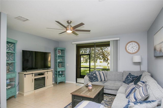 4026 Overture Cir Unit 487, Bradenton, FL 34209 - living area featuring ceiling fan and light tile patterned flooring