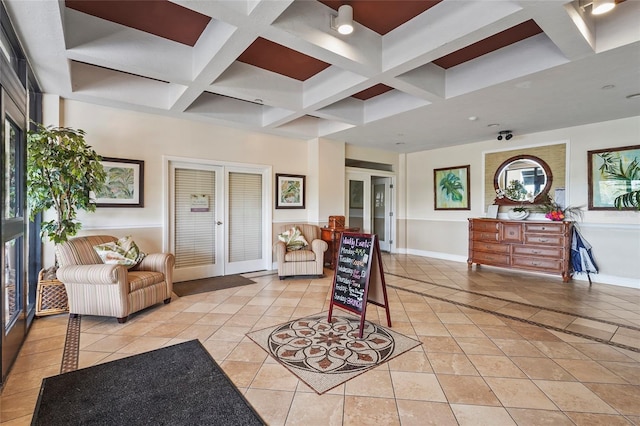 2417 Fairway Oaks Dr Unit 22, Palmetto, FL 34221 - living area with french doors, coffered ceiling, beam ceiling, and light tile patterned flooring