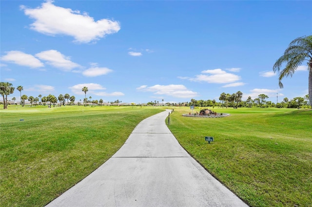 2417 Fairway Oaks Dr Unit 22, Palmetto, FL 34221 - surrounding community featuring a yard and golf course view