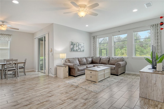 11625 Renaissance Blvd, Venice, FL 34293 - living room with a ceiling fan, wood tiled floors, and recessed lighting