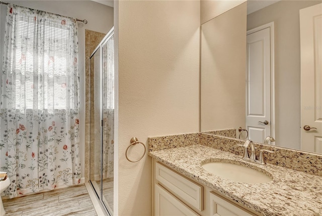 11625 Renaissance Blvd, Venice, FL 34293 - bathroom with vanity and a stall shower