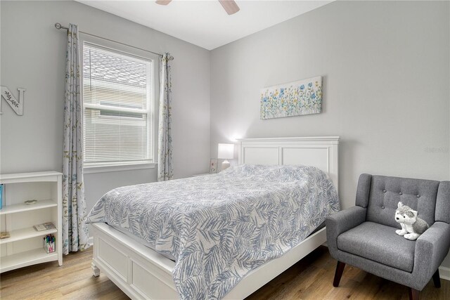 11625 Renaissance Blvd, Venice, FL 34293 - bedroom with wood finished floors and ceiling fan