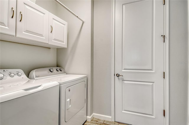 11625 Renaissance Blvd, Venice, FL 34293 - laundry room featuring washer and clothes dryer and cabinet space