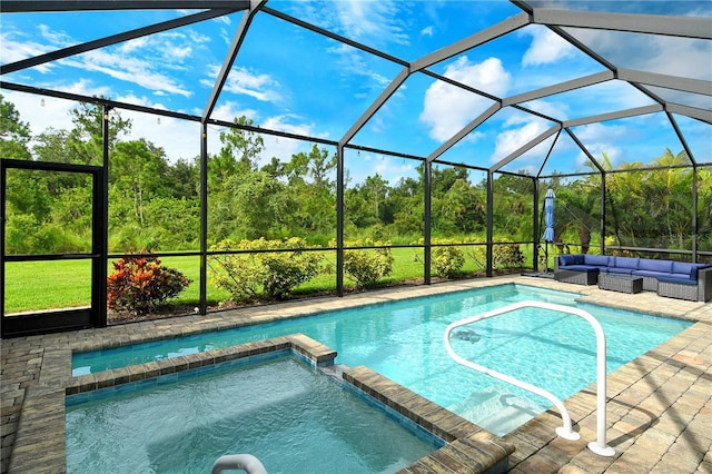 11625 Renaissance Blvd, Venice, FL 34293 - view of swimming pool with a pool with connected hot tub, outdoor lounge area, a lanai, and a patio