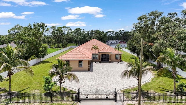 5714 38th Ave E, Bradenton, FL 34208 - view of front of property with stucco siding and a tile roof