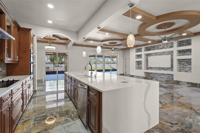 5714 38th Ave E, Bradenton, FL 34208 - kitchen with a ceiling fan, appliances with stainless steel finishes, light marble finish flooring, arched walkways, and recessed lighting