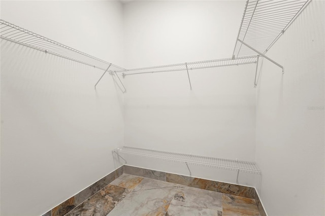 5714 38th Ave E, Bradenton, FL 34208 - walk in closet with marble finish floors