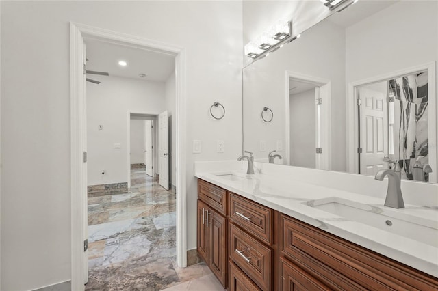 5714 38th Ave E, Bradenton, FL 34208 - bathroom featuring marble tiled flooring and double vanity
