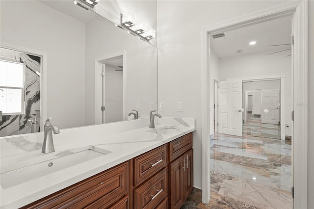 5714 38th Ave E, Bradenton, FL 34208 - bathroom with marble finish floors and double vanity