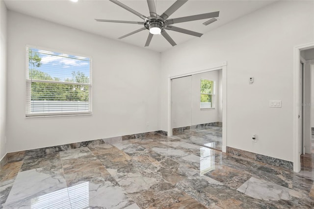 5714 38th Ave E, Bradenton, FL 34208 - spare room with baseboards and ceiling fan