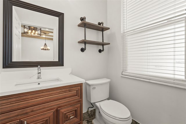 5714 38th Ave E, Bradenton, FL 34208 - bathroom with a chandelier and vanity