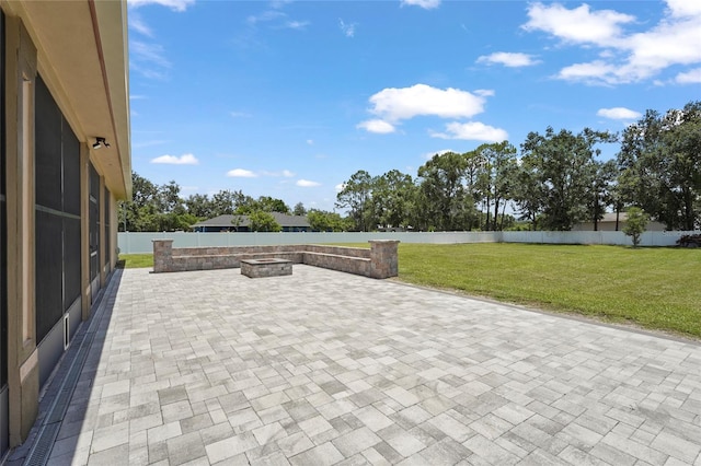 5714 38th Ave E, Bradenton, FL 34208 - fenced backyard with an outdoor fire pit and a patio