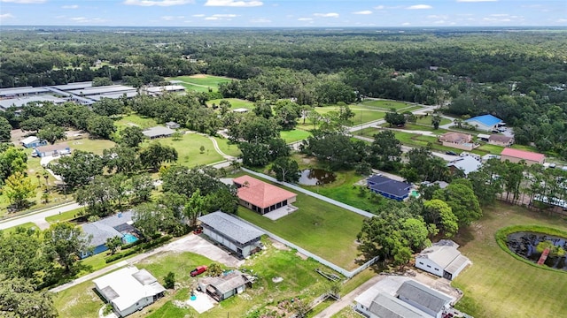 5714 38th Ave E, Bradenton, FL 34208 - aerial perspective of suburban area with a heavily wooded area