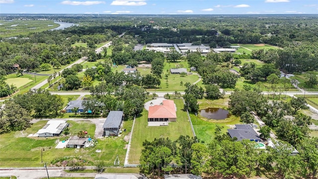 5714 38th Ave E, Bradenton, FL 34208 - drone / aerial view of a nearby body of water and a heavily wooded area