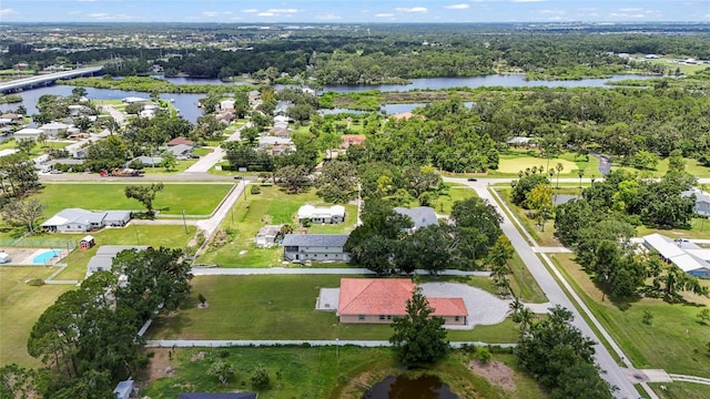 5714 38th Ave E, Bradenton, FL 34208 - aerial view of property and surrounding area with a large body of water and nearby suburban area