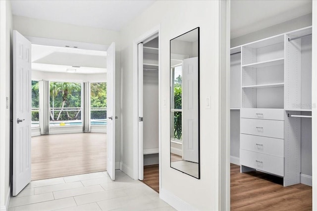 4724 White Tail Ln, Sarasota, FL 34238 - walk in closet featuring light wood finished floors