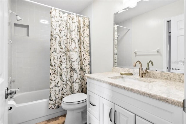 4724 White Tail Ln, Sarasota, FL 34238 - bathroom featuring vanity, shower / tub combo, and wood finished floors