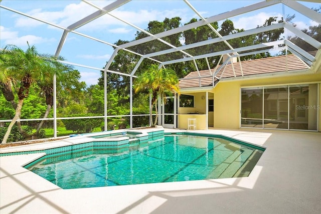 4724 White Tail Ln, Sarasota, FL 34238 - view of pool with a patio, a pool with connected hot tub, and glass enclosure