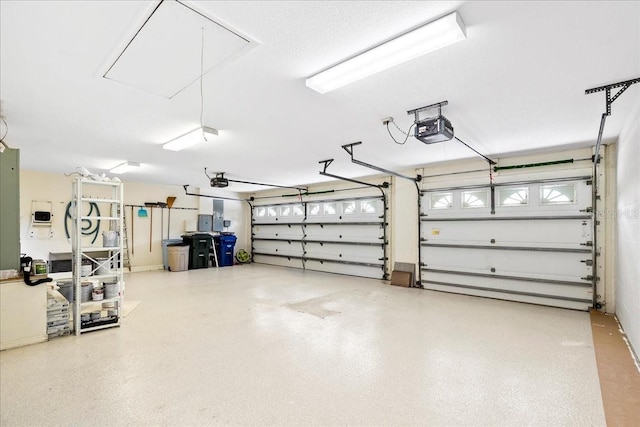 4724 White Tail Ln, Sarasota, FL 34238 - garage with a garage door opener