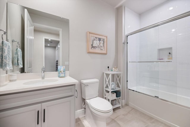 12349 Asana Ct, Venice, FL 34293 - full bathroom with vanity and combined bath / shower with glass door