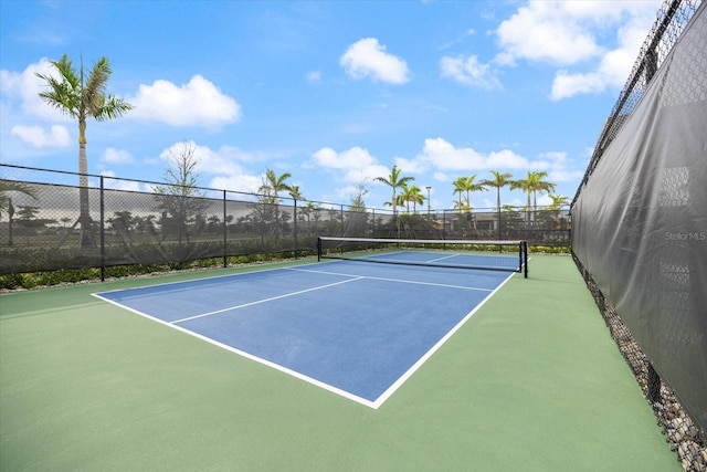 12349 Asana Ct, Venice, FL 34293 - view of tennis court featuring community basketball court