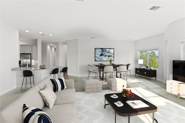 7611 34th Ave W Unit 301, Bradenton, FL 34209 - living room featuring recessed lighting and baseboards