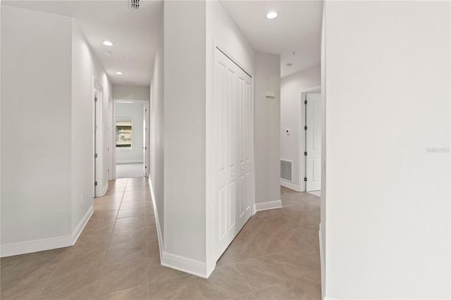 7611 34th Ave W Unit 301, Bradenton, FL 34209 - hallway featuring light tile patterned floors and recessed lighting