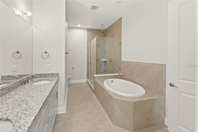 7611 34th Ave W Unit 301, Bradenton, FL 34209 - bathroom featuring vanity, a stall shower, a garden tub, tile patterned floors, and recessed lighting